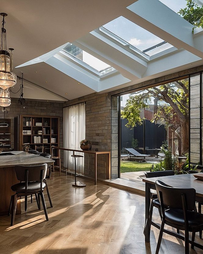 Sunlight Through Skylights and Stone Walls