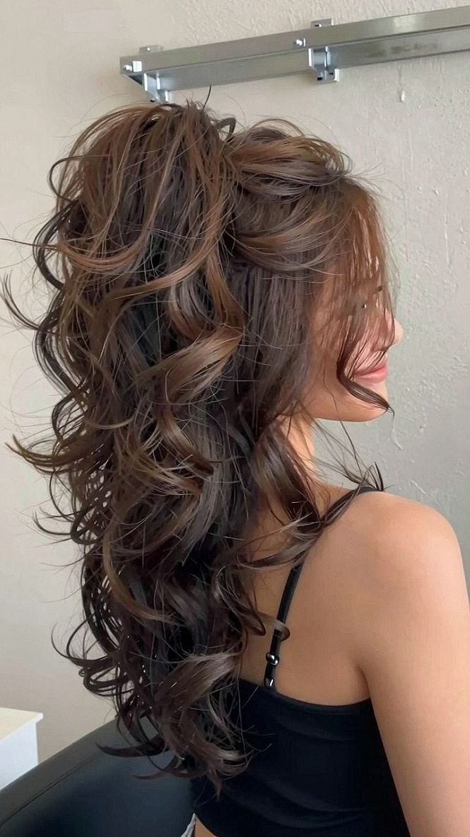 Half Up High Ponytail With Voluminous Curls