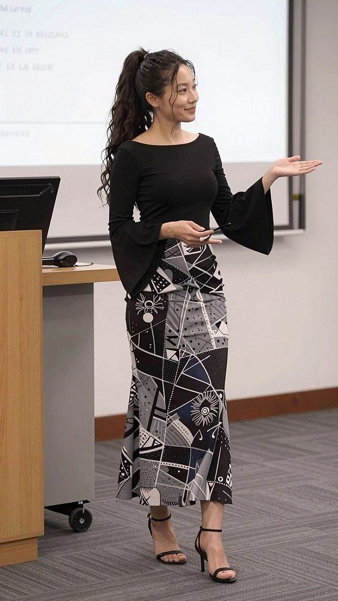Pairing a Black Fitted Top with a Patterned Midi Skirt
