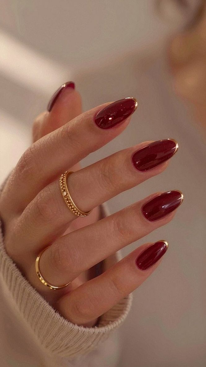 Applying Metallic Gold Edge Details on Burgundy Nails
