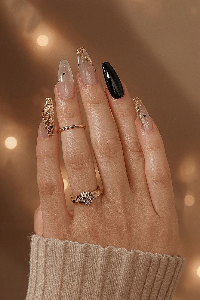 Classy Almond Nails: Sophisticated Black & Gold Accents for 2026