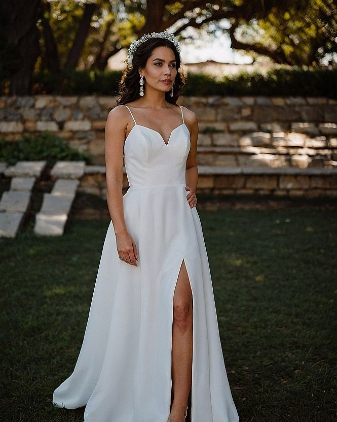 Structured Bodice Meets Flowing Skirt with High Slit