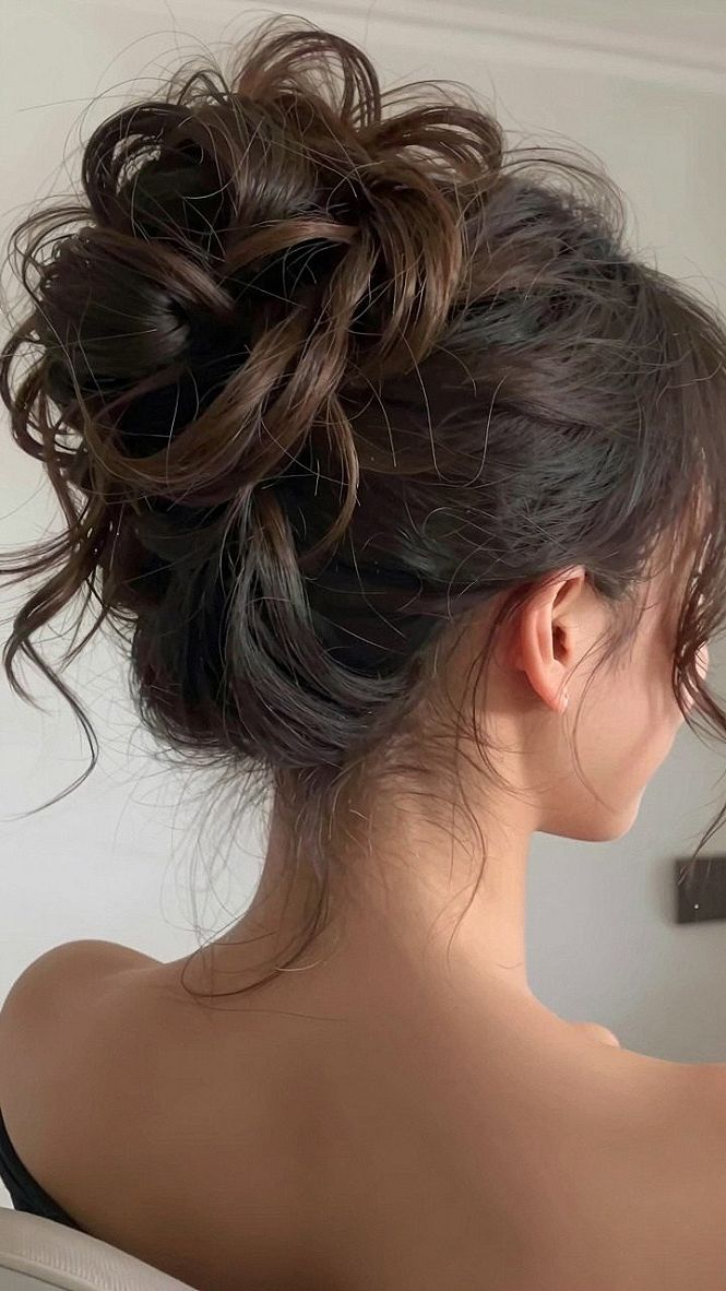Creating a Voluminous Curly Low Bun for Your Ceremony