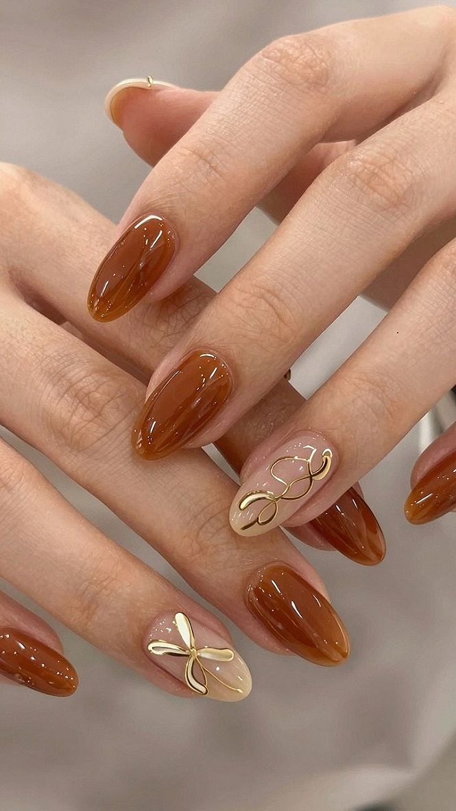 Glossy Amber Brown And Beige Nails With Gold Accents