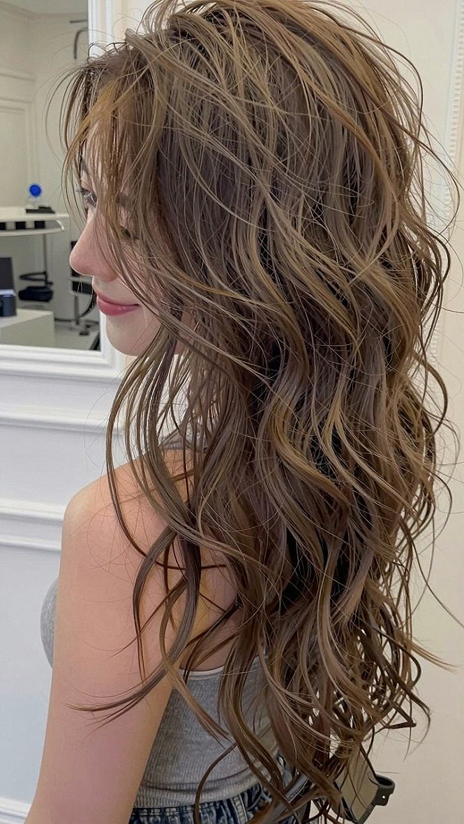 Finishing Your Half Up Style with Messy Texture and Tousled Waves