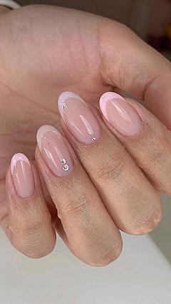 Classic Pink French Tip Nails With A Soft Glazed Finish