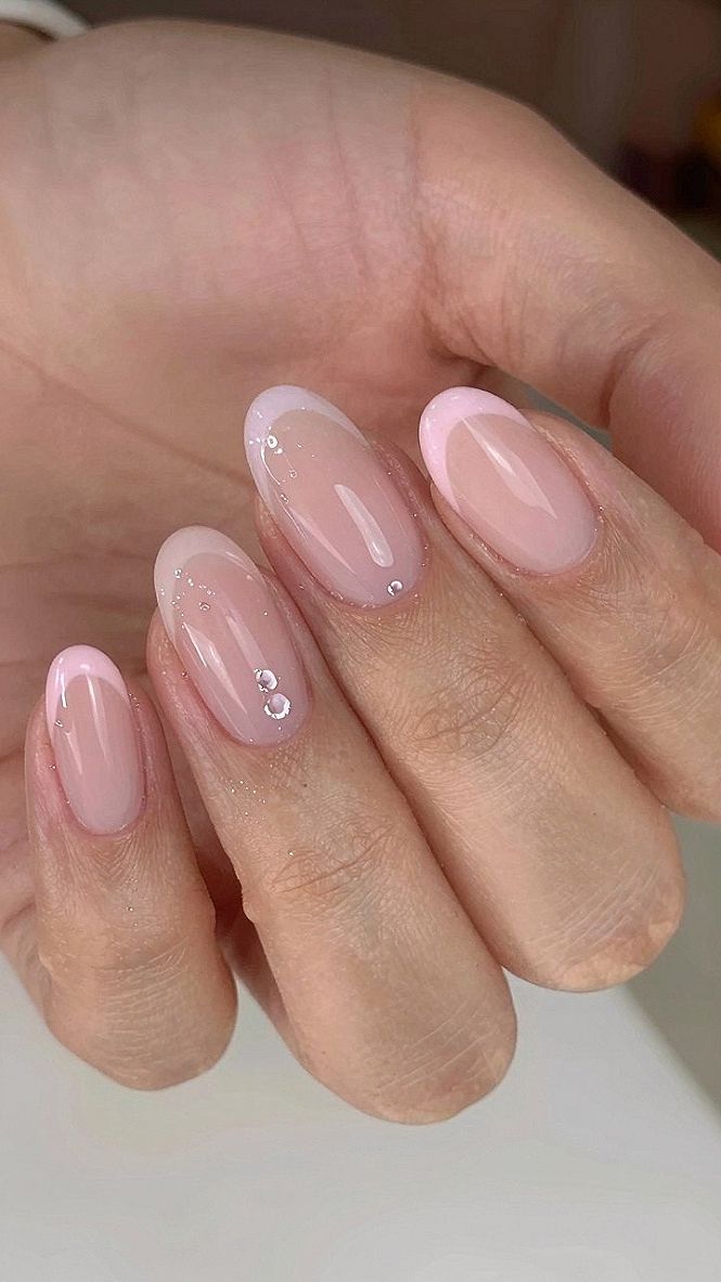Classic Pink French Tip Nails With A Soft Glazed Finish
