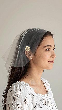 Securing a Sheer Scarf with Decorative Pins
