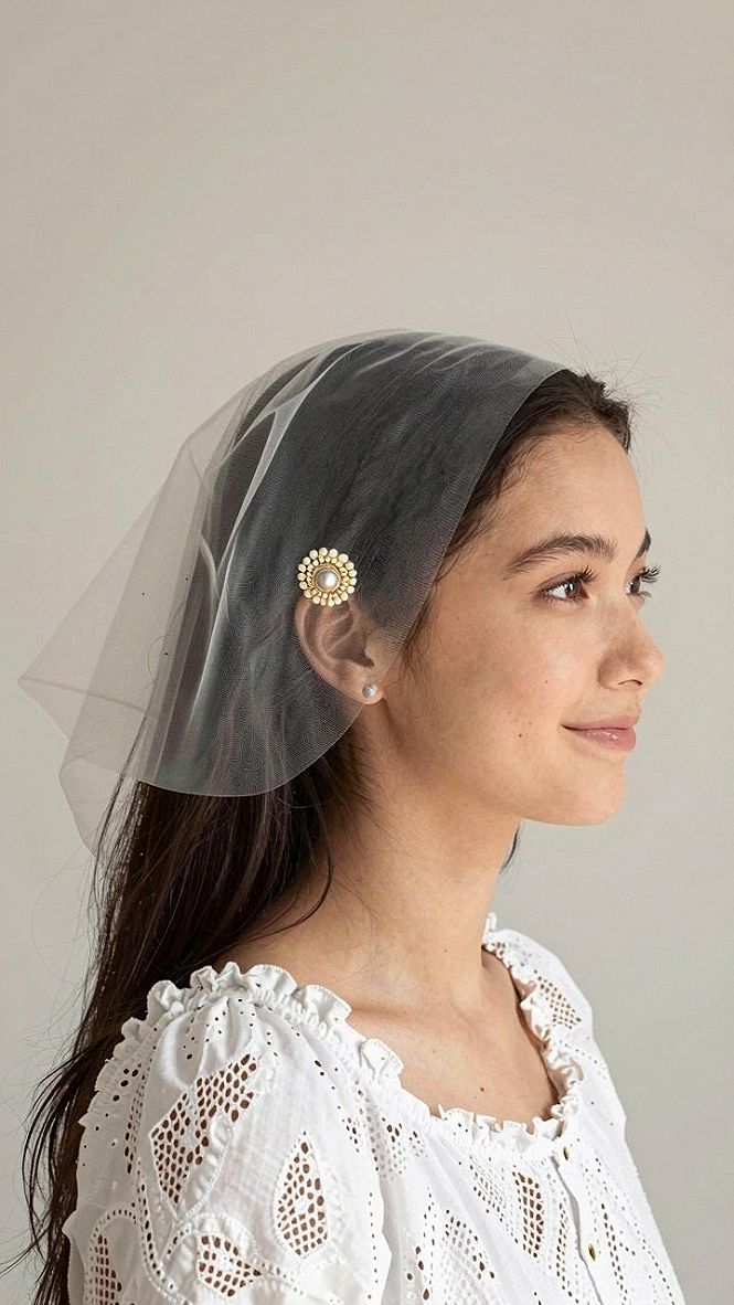 Securing a Sheer Scarf with Decorative Pins