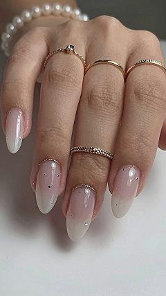 Minimalist Metallic Accents on Neutral Acrylic Nails