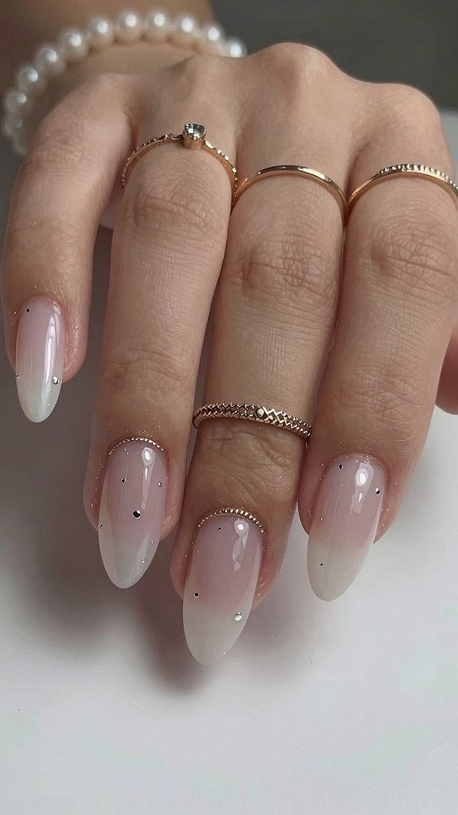 Minimalist Metallic Accents on Neutral Acrylic Nails