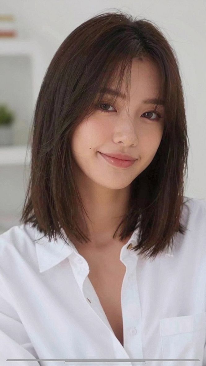 Why Medium Length Straight Hair Works With Long Fringe