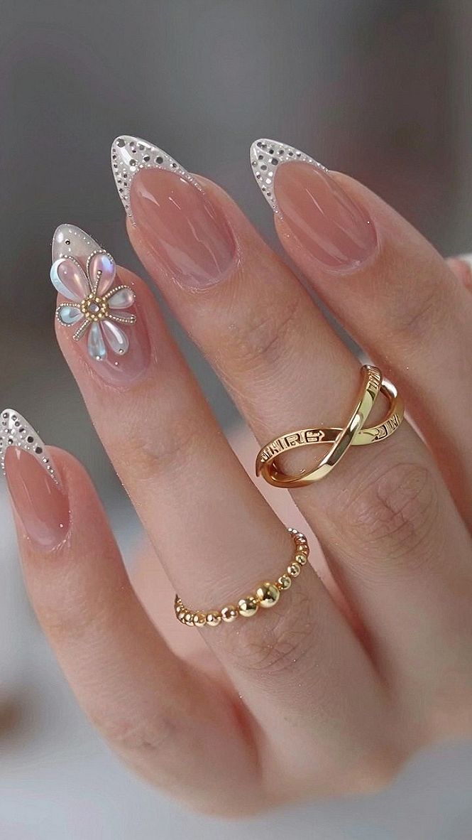 Chic Floral Accent Nails With Soft Blue Tones
