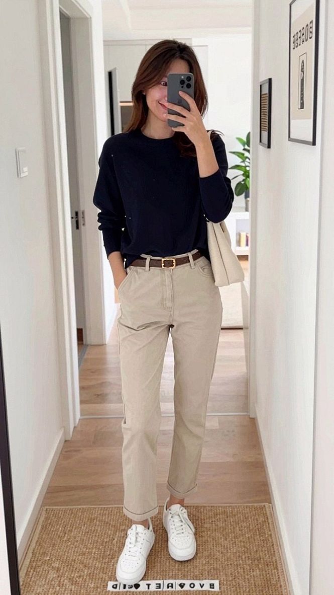 Styling a Dark Sweater With Beige Pants and White Sneakers