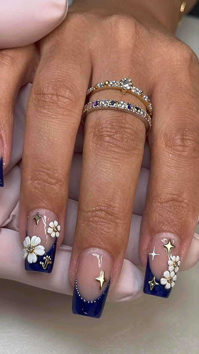Deep Burgundy Nails with Stars and White Petals
