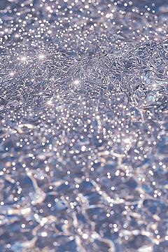 Iridescent Ocean Waves: Your Sparkly Summer iPhone Wallpaper