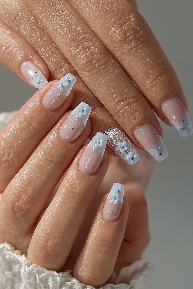 Dreamy Blue Floral Almond Nails for Summer 2024