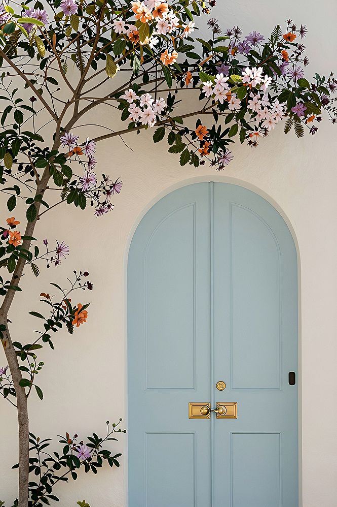 Framing an Arched Front Door with Pastel Climbing Roses