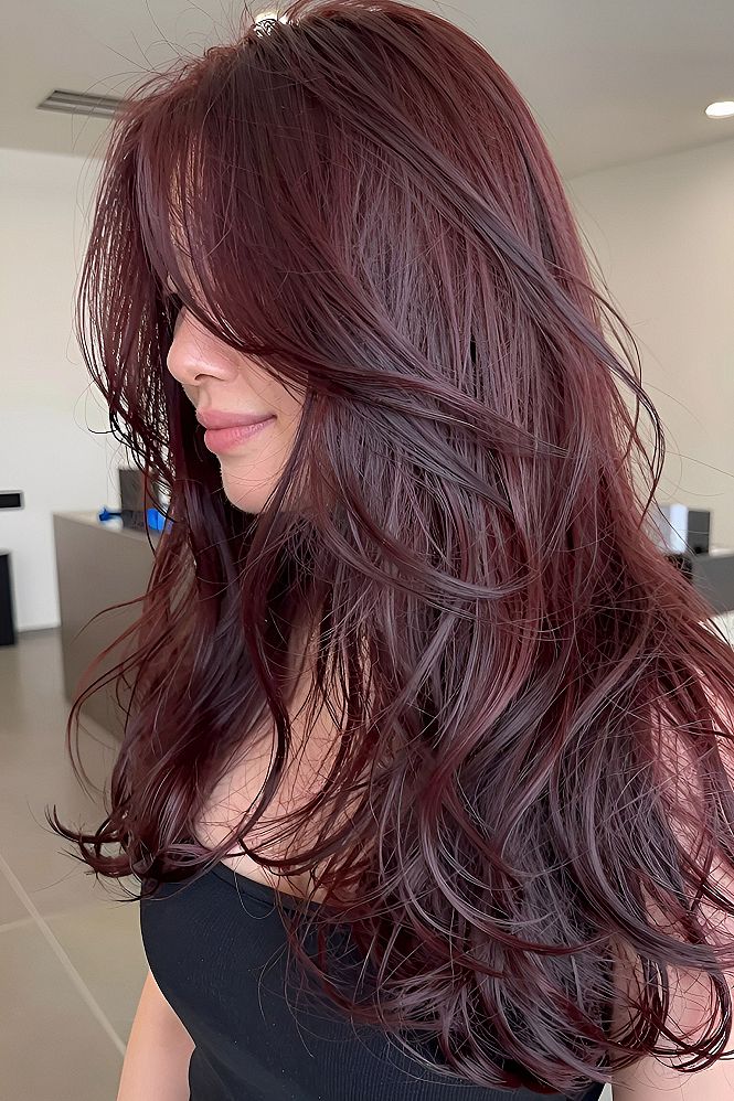 Rich Burgundy Layers with Soft Curtain Bangs