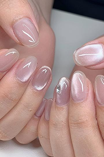 Subtle Shimmer and Gem Accents for Short Nails