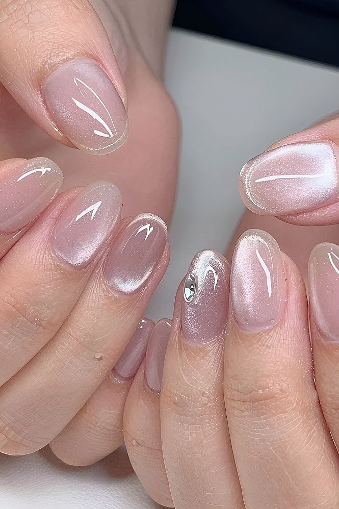 Subtle Shimmer and Gem Accents for Short Nails