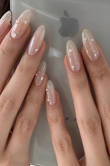 Soft Milky Nails Dotted With Tiny Pearls