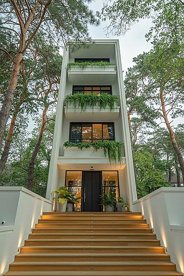 3-Story Modern Minimal Home with Lush Greenery & Glass Facades