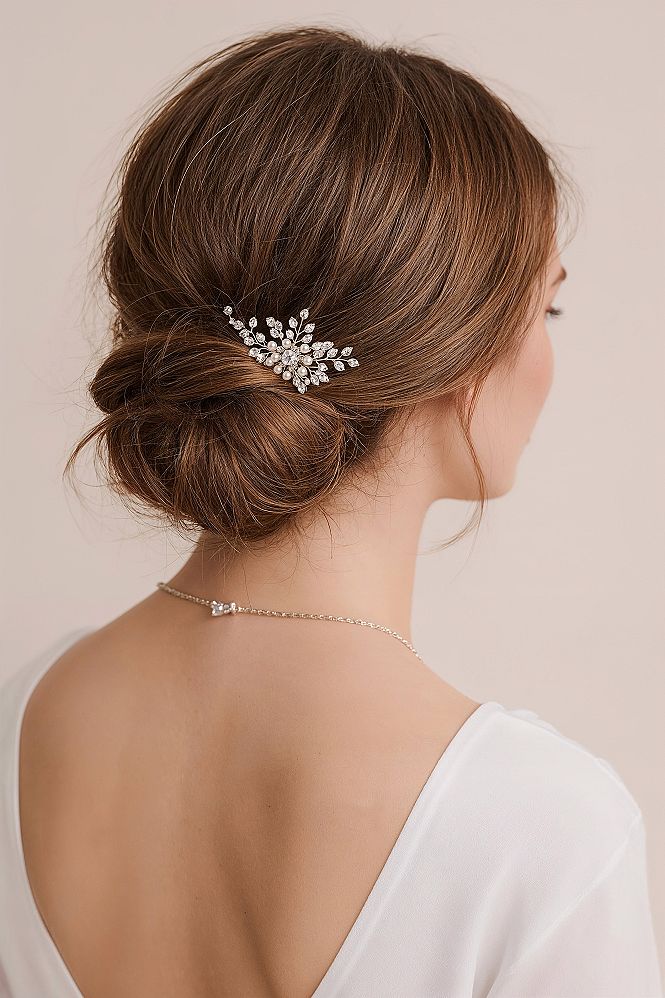 Minimalist Bridal Updo: Chic Low Bun for the Modern Bride