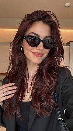 Why Rich Burgundy Tones Work So Well on Dark Brown Hair