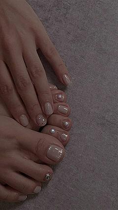 Adding Subtle Pearl Accents To Neutral Matching Nails