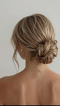 Why a Messy Low Bun Works Best for Modern Brides