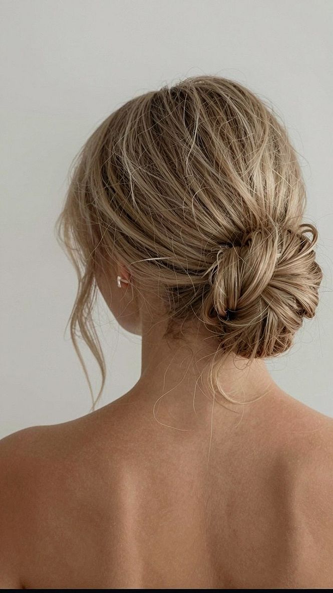 Why a Messy Low Bun Works Best for Modern Brides