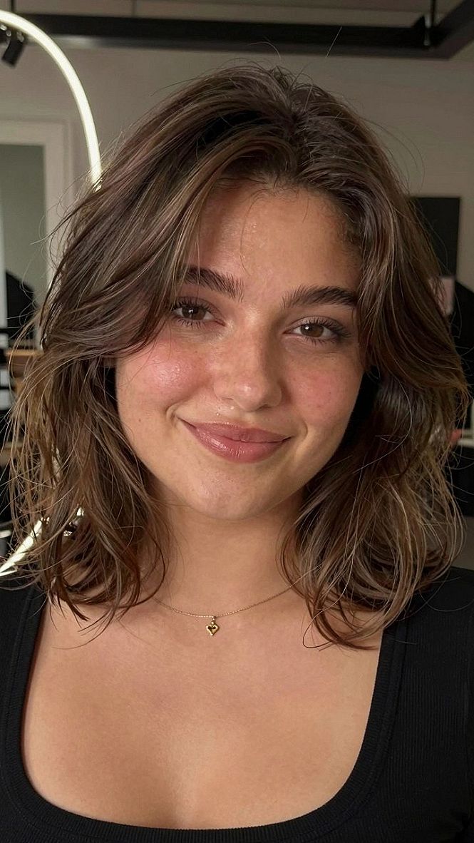 Selecting a Wavy Layered Bob for Natural Volume