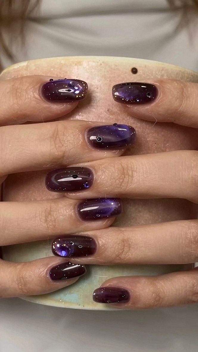 Choosing Deep Plum Velvet Polka Dot Cat Eye Nails