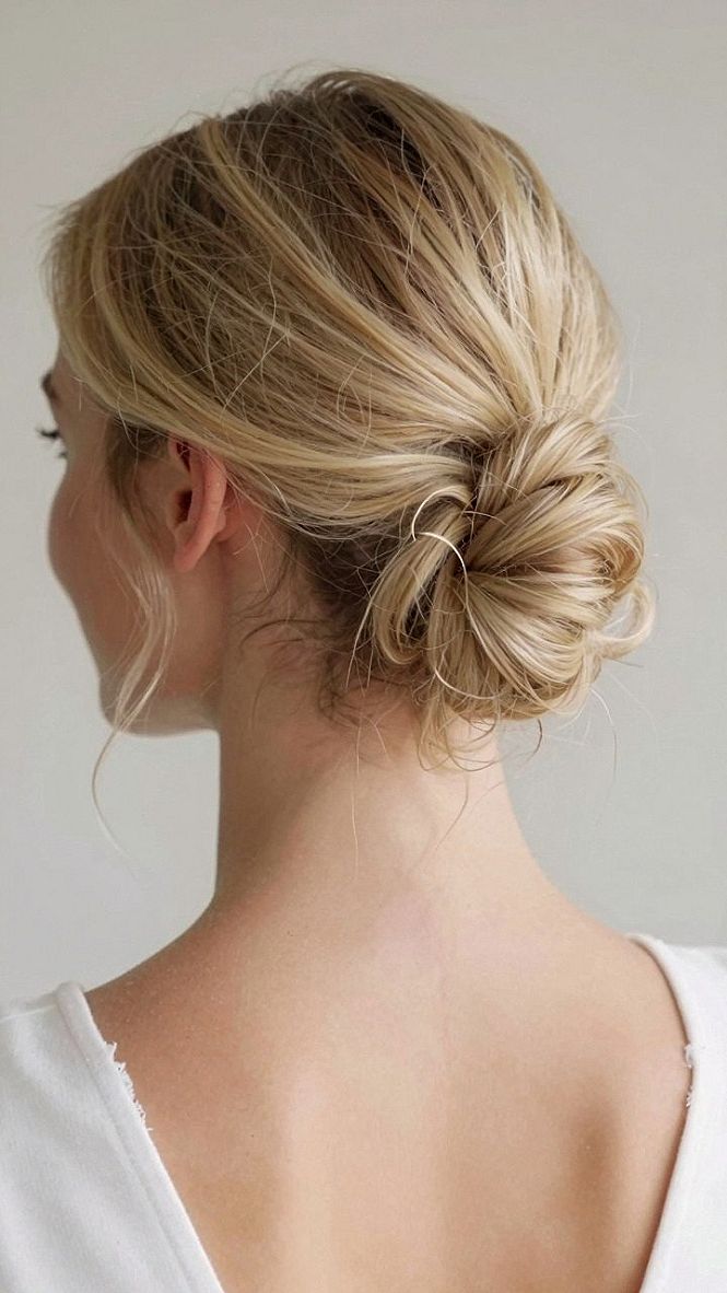 Selecting a Sleek Twisted Neckline Bun for Your Ceremony