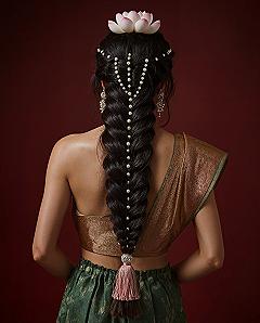Elegant Saree Function Hairstyles: Fishtail Braid with Pearls & Flowers