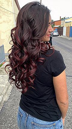Maintaining Glossy Curls in Medium Cherry Cola Hair