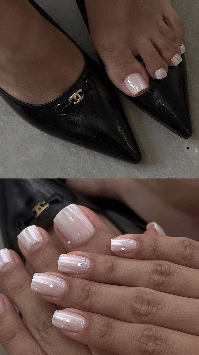 Applying Tiny Rhinestone Details To Matching Nails