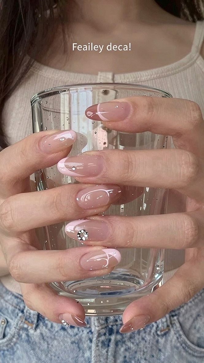 Adding Rhinestones and French Tips to Warm Pink Chrome Nails