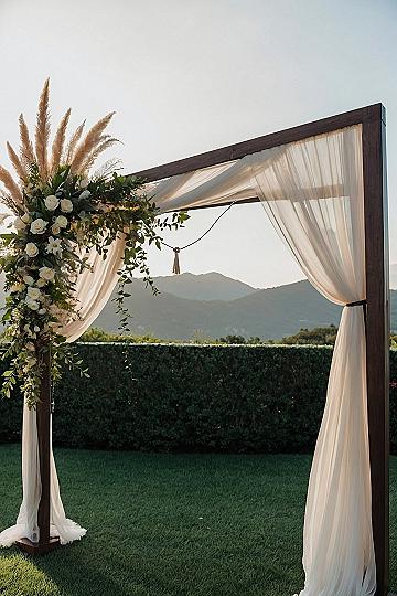Square Wooden Wedding Arches With Draping Fabric