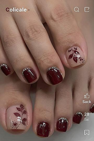 Adding Delicate Leaf Art to Burgundy Gel Pedicures
