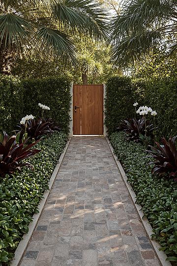 Elevating Small Tropical Front Yard Landscaping with Exotic Details