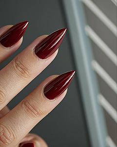 Why Dark Red Stiletto Nails Work for Spooky Season