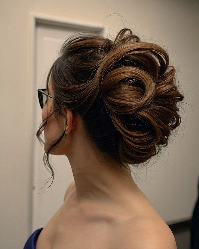 Textured Rolled Chignon for a Sophisticated Prom Night