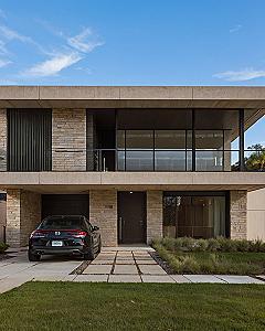 Adding A Glass Balcony To A Modern Stone Façade