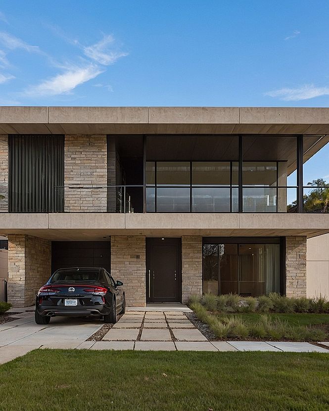 Adding A Glass Balcony To A Modern Stone Façade
