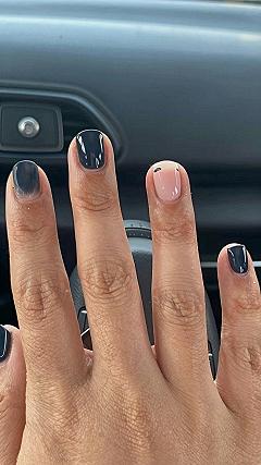 Why Dark Nail Polishes Complement Warm Medium Skin Tones