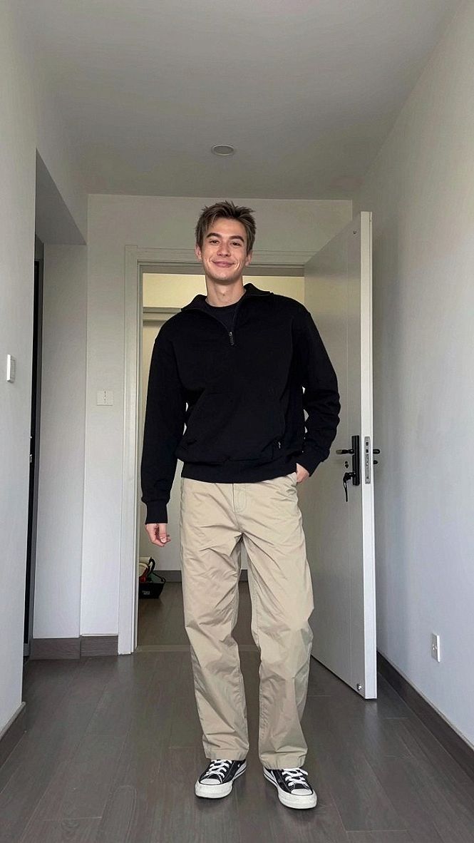 Pairing Neutral Chinos with a Simple Dark Knit