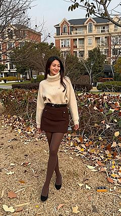 Pairing a Chunky Turtleneck with a Tailored Mini Skirt