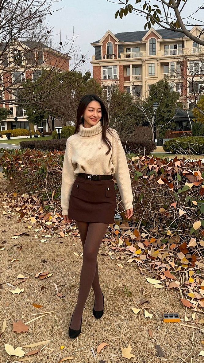 Pairing a Chunky Turtleneck with a Tailored Mini Skirt